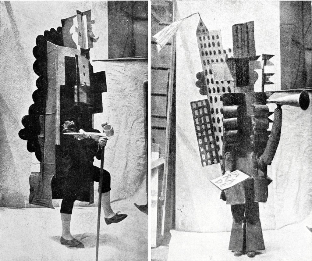 Two of the costumes designed by Picasso and made of wood, papier-mâché, metal and cloth.